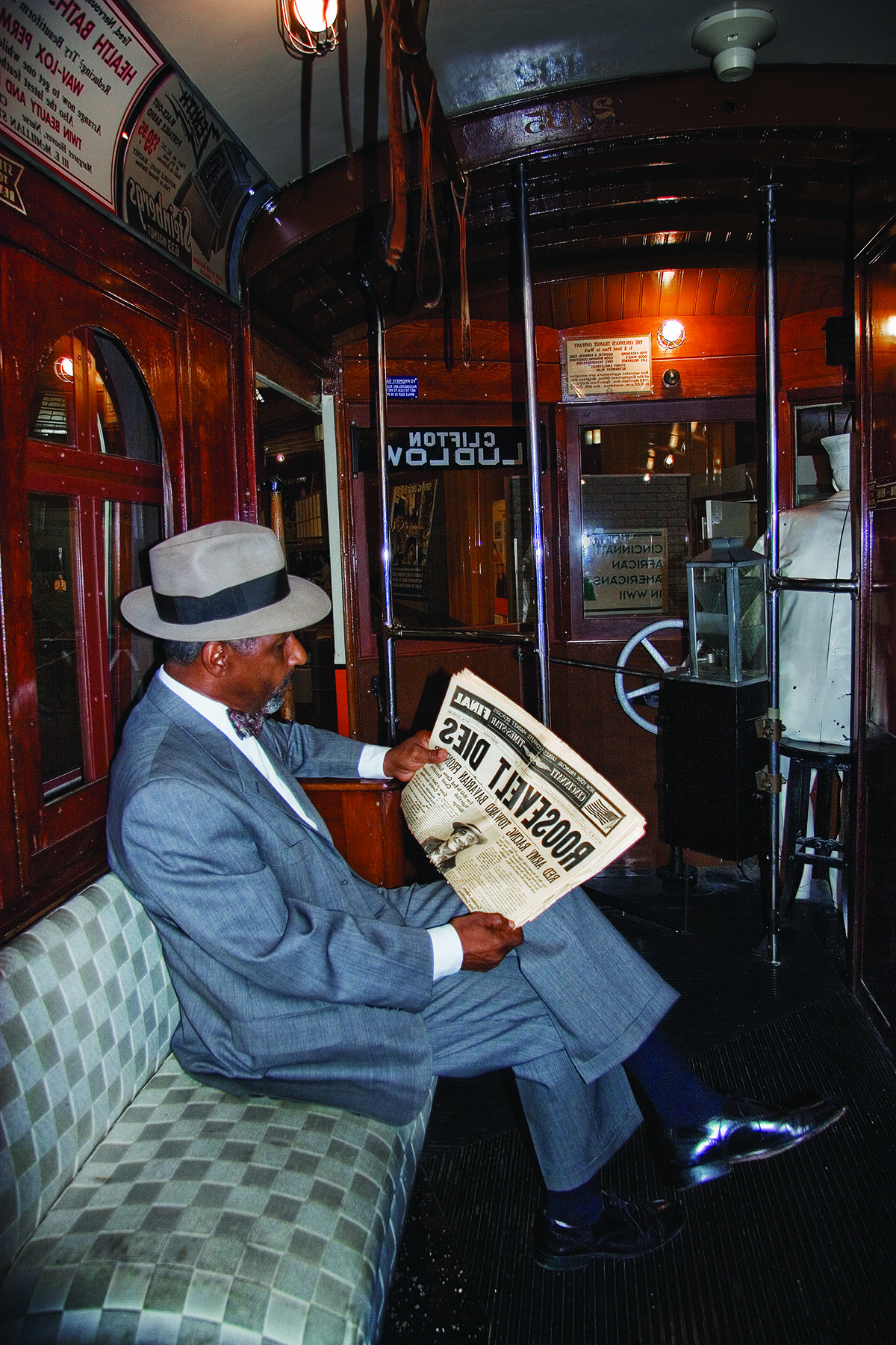 image of man reading a newspaper